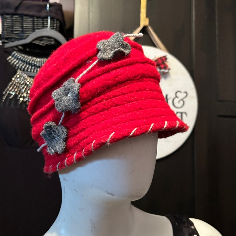 Red felted, embellished hat
